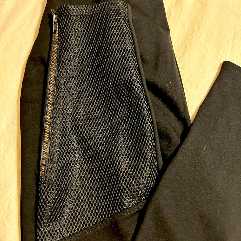 Super cute size Med Lysse Black with fishnet at the bottom around the ankle.